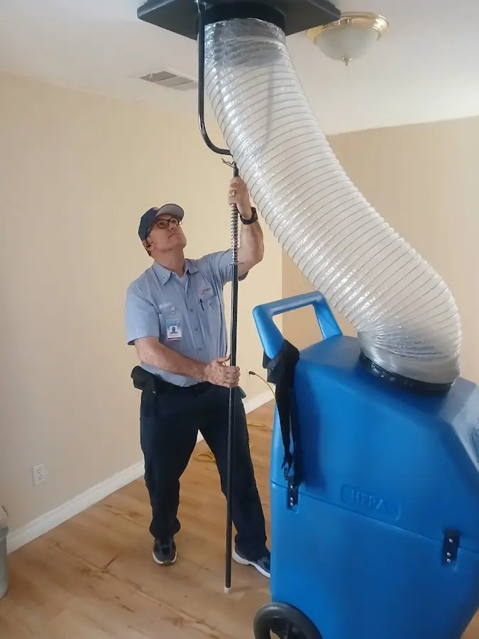 HVAC Installation technician using HEPA equipment in Addison